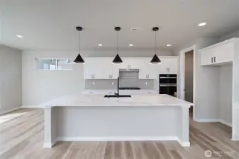 Photos are of another home in the community and are for illustration purposes only to reflect typical finishes.  May depict seller enhancements.  Colors and options may vary.