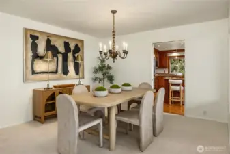 The door at the back of the photo leads to the kitchen/family room.