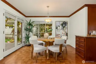 At one end of the kitchen is room for an eat-in table and chairs.