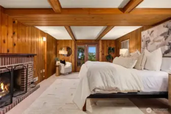 This room is staged as a bedroom (no closet), but could easily be a rec-room with a cozy fireplace and French door access to the backyard.
