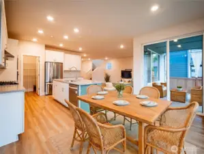 DIGITALLY STAGED DINING AREA...