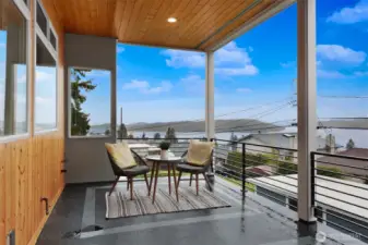 Covered outdoor deck with stunning lake views