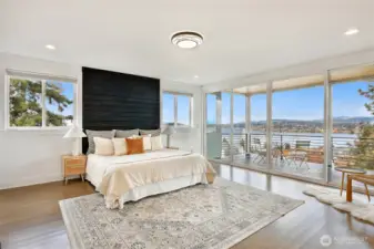 Primary bedroom with expansive lake views