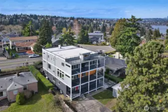Aerial view of the home and surrounding neighborhood