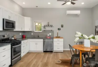 A cozy kitchen with decent cabinet space.
