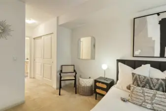 Convenient bedroom layout with walk-in closet and an additional big closet, leading to ensuite bathroom.