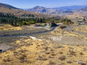 Shared well is located beside the current driveway.