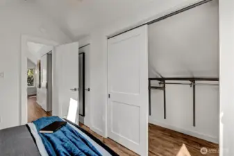 Organizing systems make the most of this double closet in Primary Bedroom.