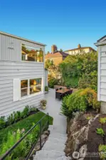 From patio to detached garage in alley.