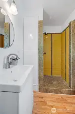 The 3/4 bath was updated in 2022 and features a super cool custom tile installation.