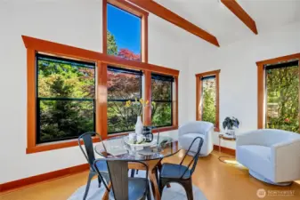 The East facing windows in the kitchen were specifically designed to showcase the majestic evergreen firs trees on the East end of the property, eliciting a feeling of being in the woods and nature year round.
