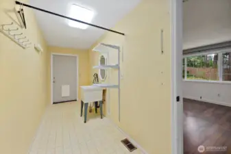Utility room with a door to the yard