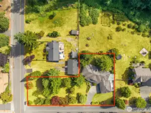 Corner lot presents exciting development possibilities. Property lines are approximate. Buyer to verify all info to their satisfaction.