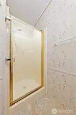 Primary bathroom also still has a shower