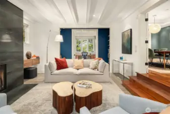 Exposed beam ceilings warm the room and sonos sound system throughout