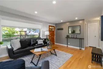 This inviting space offer modern finished & seamless flow to the entry.