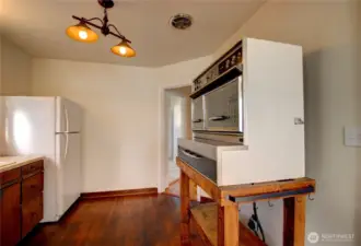 The kitchen offers a fun (and working) 1960 Frigidaire Flair oven/stove.