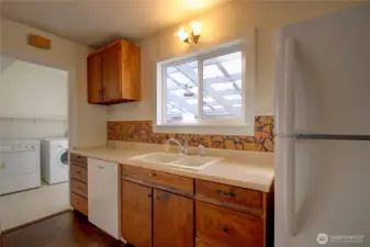 The utility room is at the back door.