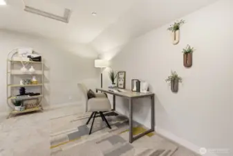 Upstairs bonus room staged as a home office, perfect for today’s flexible lifestyle