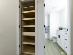 Professionally installed pullouts for easy access to Pantry in Hallway. 2nd bathroom in Hallway New cabinets.  Shower tub.