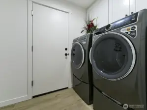 Laundry room Includes new washer and dryer upgraded. Cabinets for storage.