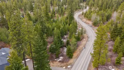 Enjoy close proximity to Nelson Farm gatherings, trails, and year-round recreation, while returning home to a setting that feels tucked away and distinctly serene.