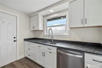 Door to garage conveniently off of kitchen