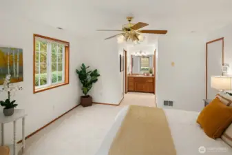 Primary suite with new carpet and paint and a large walk-in closet.