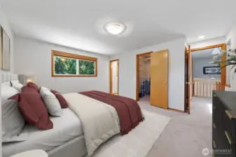 Primary bedroom is quite spacious~walk-in closet and 3/4 bathroom
