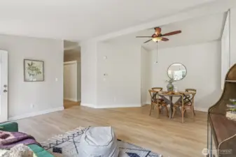 Another view as you enter the house. To the left is a hallway to the 3 bedrooms.