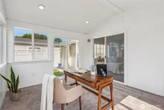 The bonus room has access to the backyard.