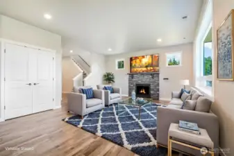 Great room on main level with stunning views, gas fireplace, all mounted tv's stay