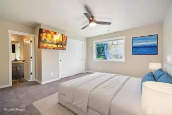 Upper level bedroom adjacent to jack & jill bathroom