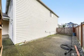 RV parking with 30 Amp Service, behind gate in backyard