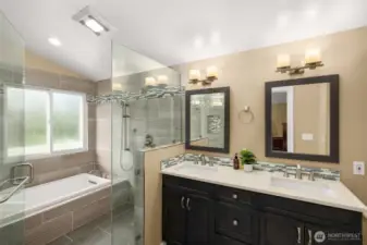 Primary ensuite, walk-in shower with soaking tub and a double sink quartz vanity.