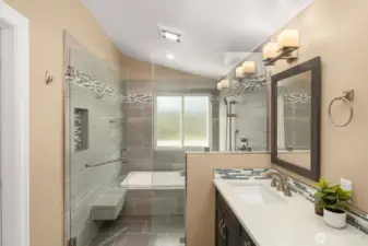 Primary ensuite, walk-in shower with soaking tub and a double sink quartz vanity.
