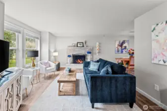 Updated laminate floors throughout and cozy fireplace!