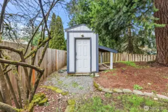 Lovely garden shed and wood storage