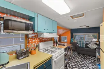 Feels cozy and warm but also has plenty of dining and seating area just off the kitchen.