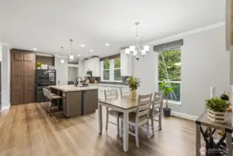 Bright dining space perfectly positioned between the kitchen and living room.