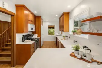 Spacious kitchen with ample storage.