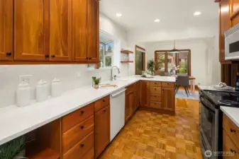 Spacious kitchen looking into dining space.