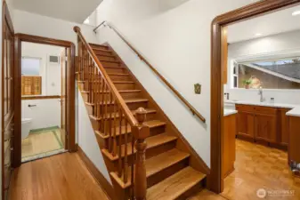 Seamless flow between kitchen,living room, powder bath and bedroom.