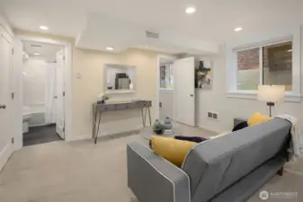 Lower level living space with bonus room, bedroom, bath, and separate entrance that has been used for STR.