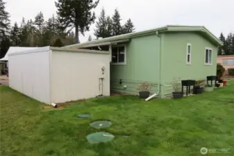 Back of Storage Area and Home. Storage Unit is the Parks.