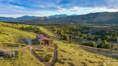 Set on 14 acres with room for horses, lots of parking, gardens and more