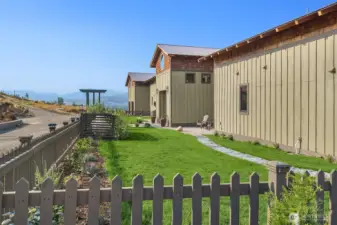 Perfect fenced area for dogs, don't miss the "garden room" off the entry patio area