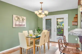 Perfect dinning room space with french doors leading to the large deck.
