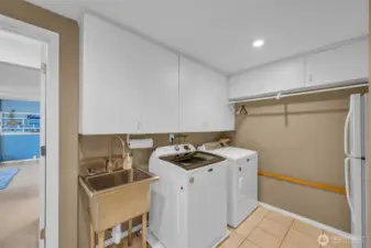 Large utility room.  Washer and Dryer stay
