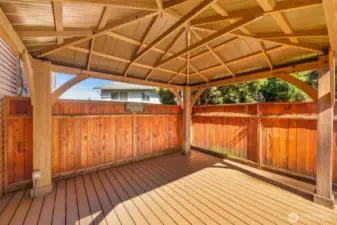 With attached gazebo on side of home